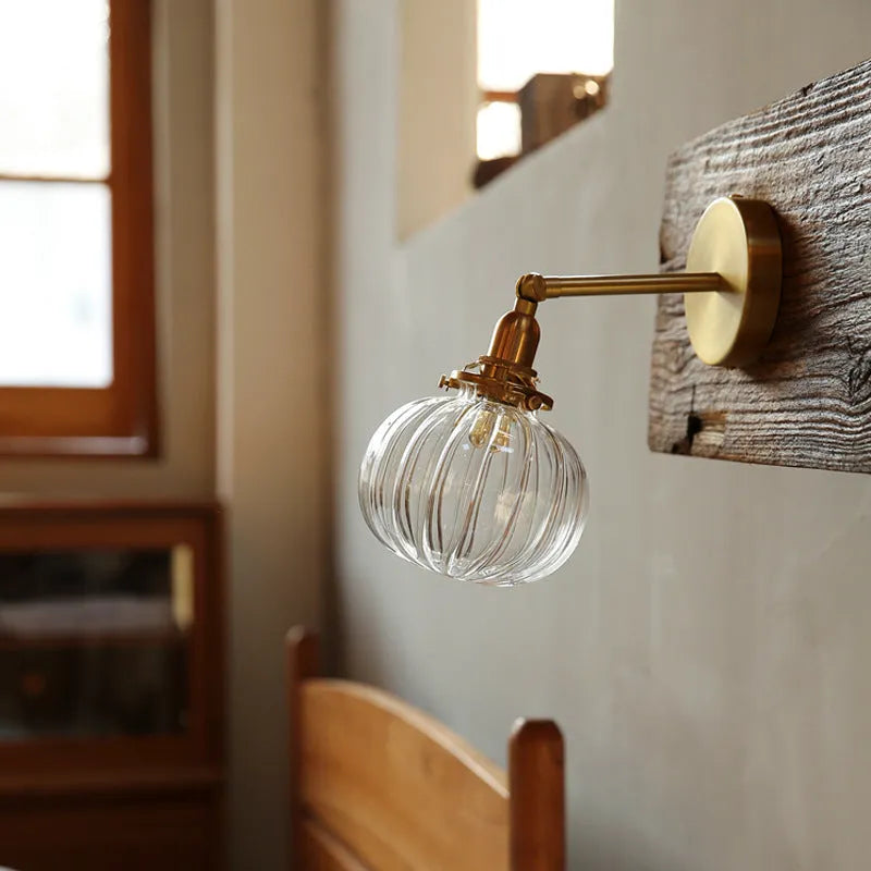 Pumpkin-shaped glass wall lamp for living room or bedroom accent lighting