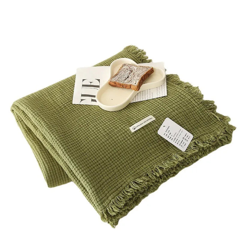 Four-layer gauze cotton blanket with tassel trim in navy blue colour