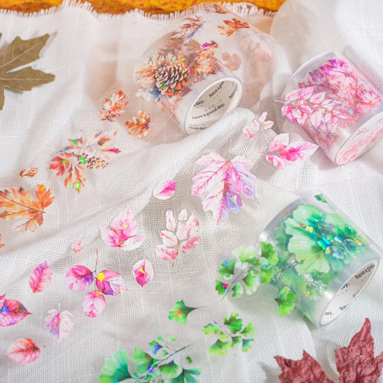 Roll of PET decorative stickers with six leaf patterns including ginkgo and maple designs for DIY projects