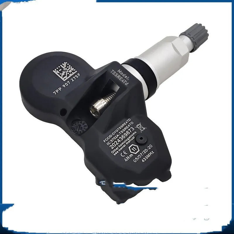 Black car tyre pressure monitoring sensor unit for Audi vehicles.