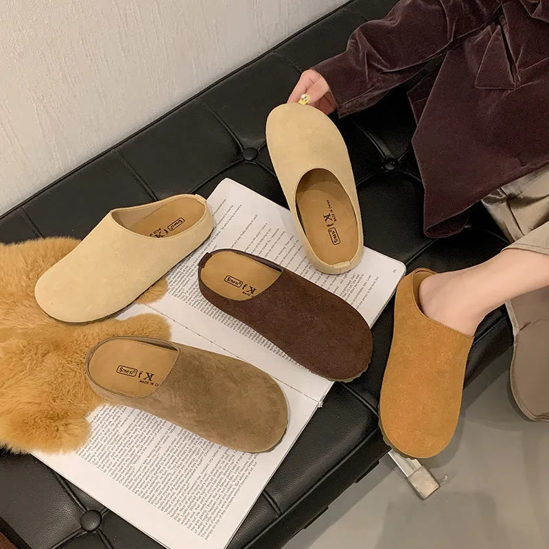 Soft flat slip-on slippers in apricot colour with square toe and microfibre upper.