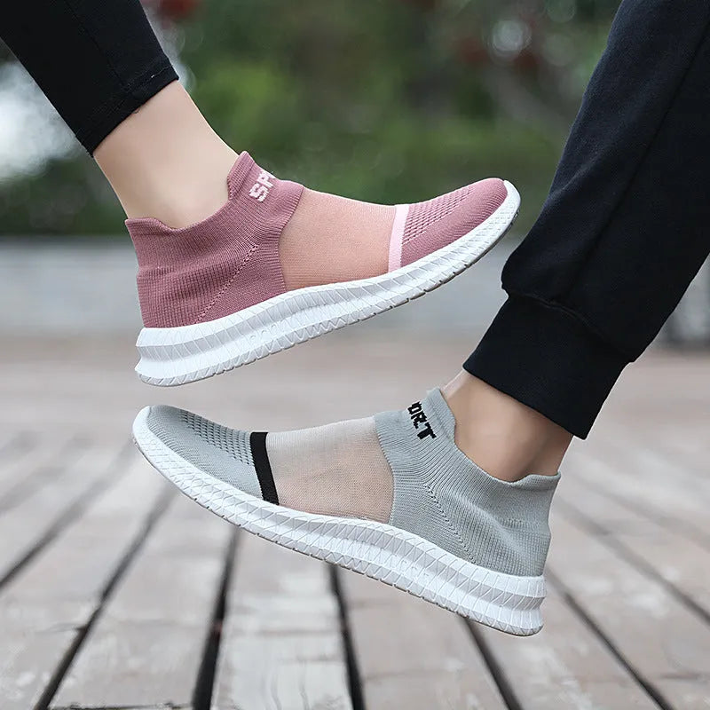 Casual flyknit sock shoes with lace design in khaki colour, showing low-top silhouette and round toe.