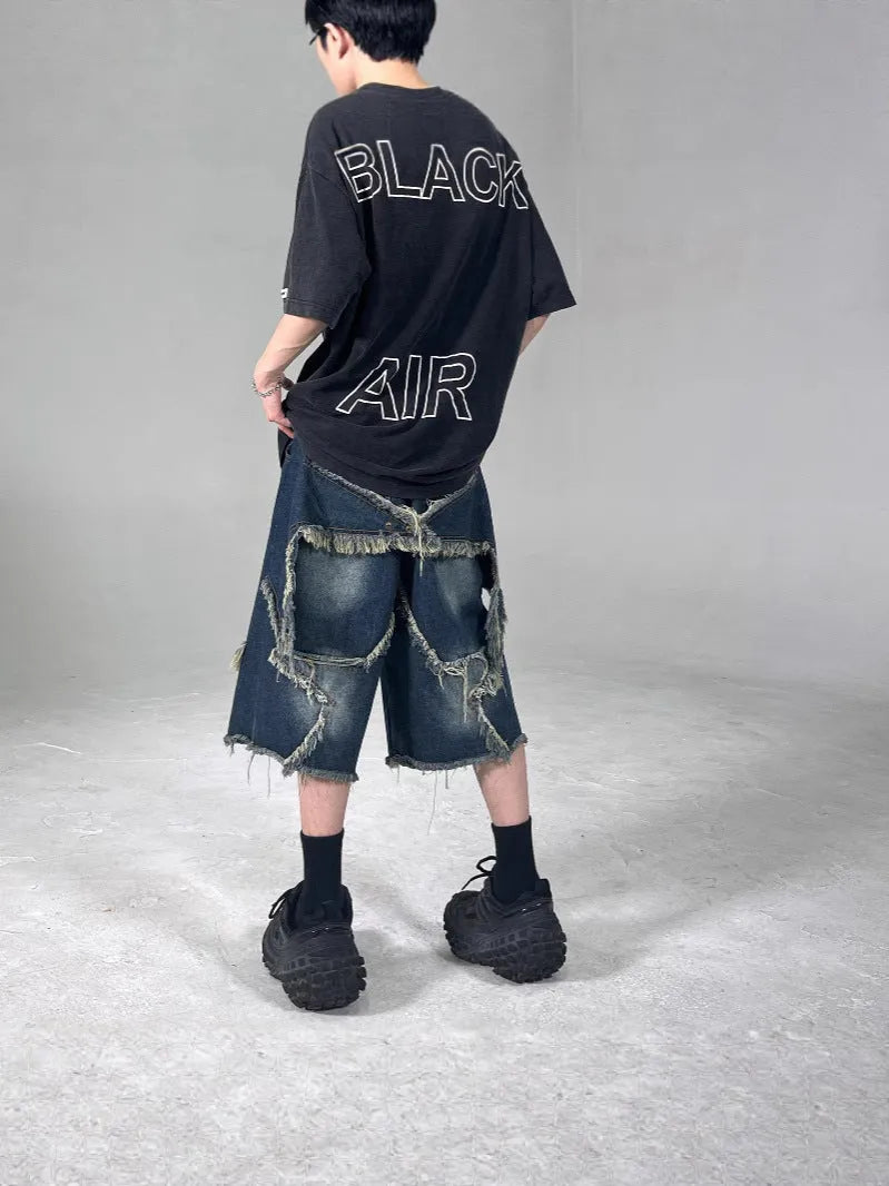 Blue men's denim shorts with frayed hem and five-pointed star decoration in loose retro style