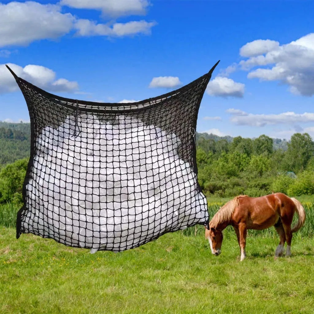 Woven grid horse feeding bag in black or white colours with hanging straps for livestock feeding
