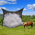 Woven grid horse feeding bag in black or white colours with hanging straps for livestock feeding