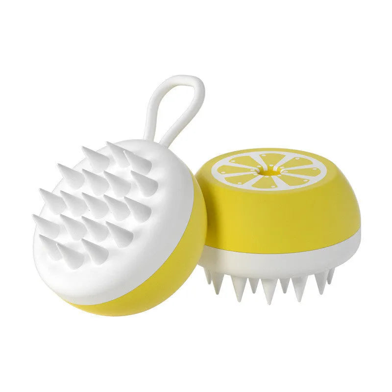 Yellow silicone pet bath brush with massage head for dog and cat grooming during bathing