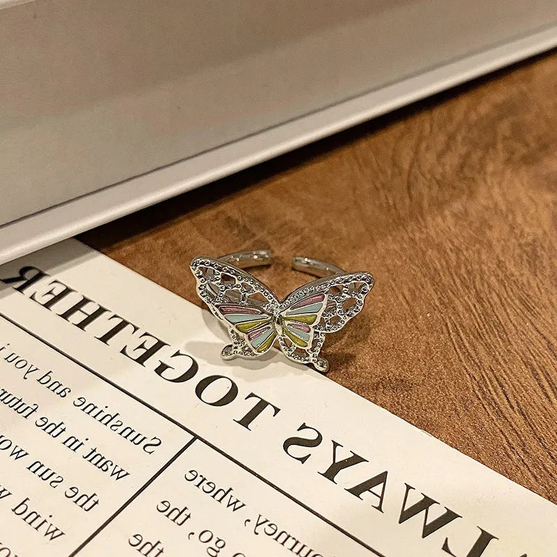 Copper Chinese butterfly women's ring showing creative design with oil dripping treatment finish