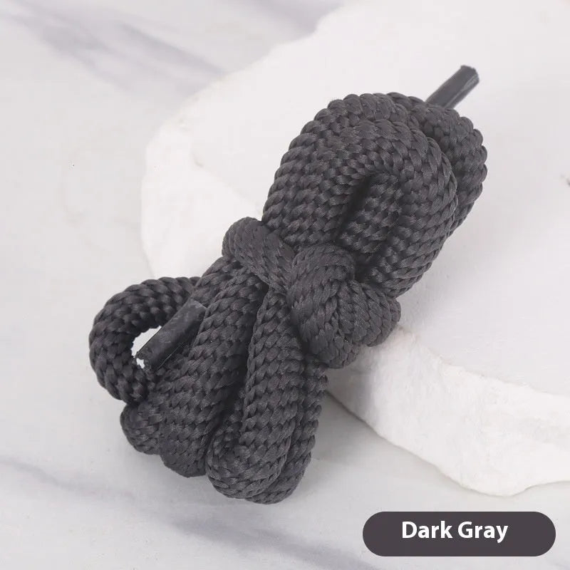 Oval elastic shoelace adapter ropes in various colours on a white background.