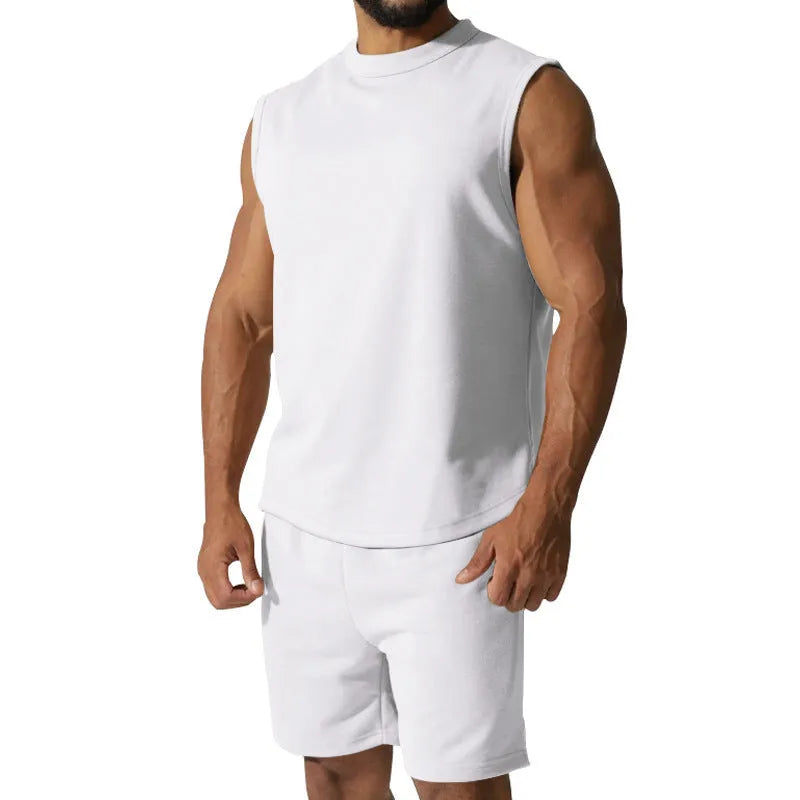 Men's sleeveless sports suit set in cotton blend with matching shorts in solid colour options