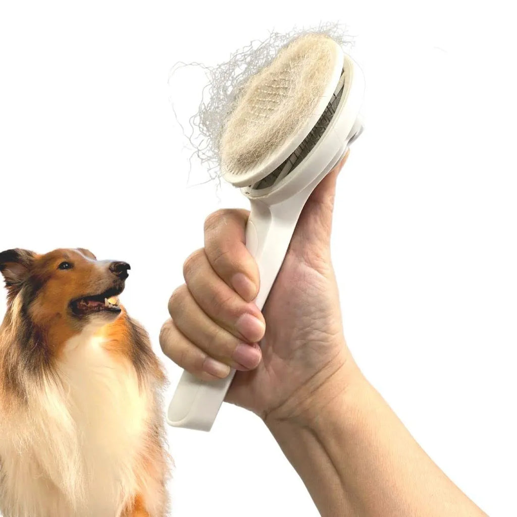 Blue self-cleaning pet slicker brush with ergonomic rubber handle on a grey background.