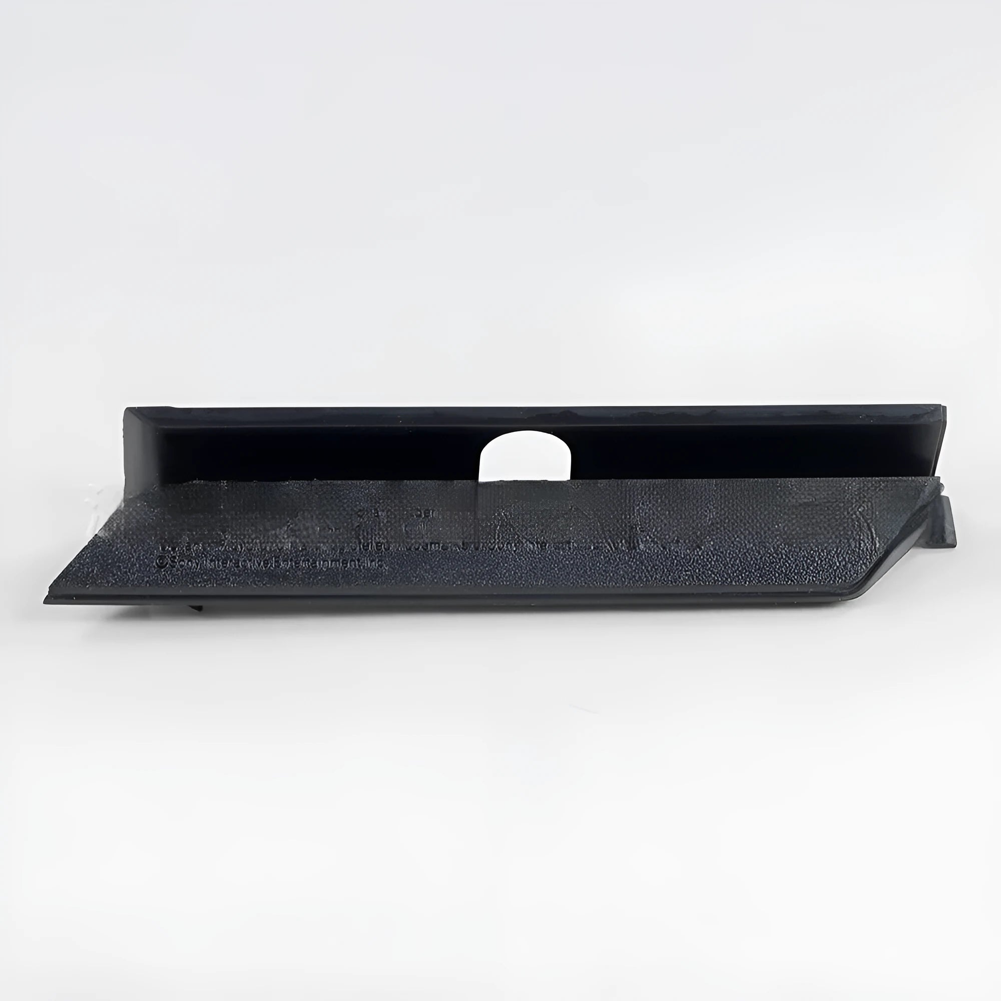 Black and white plastic 3.5-inch hard drive bay cover for PC cases.