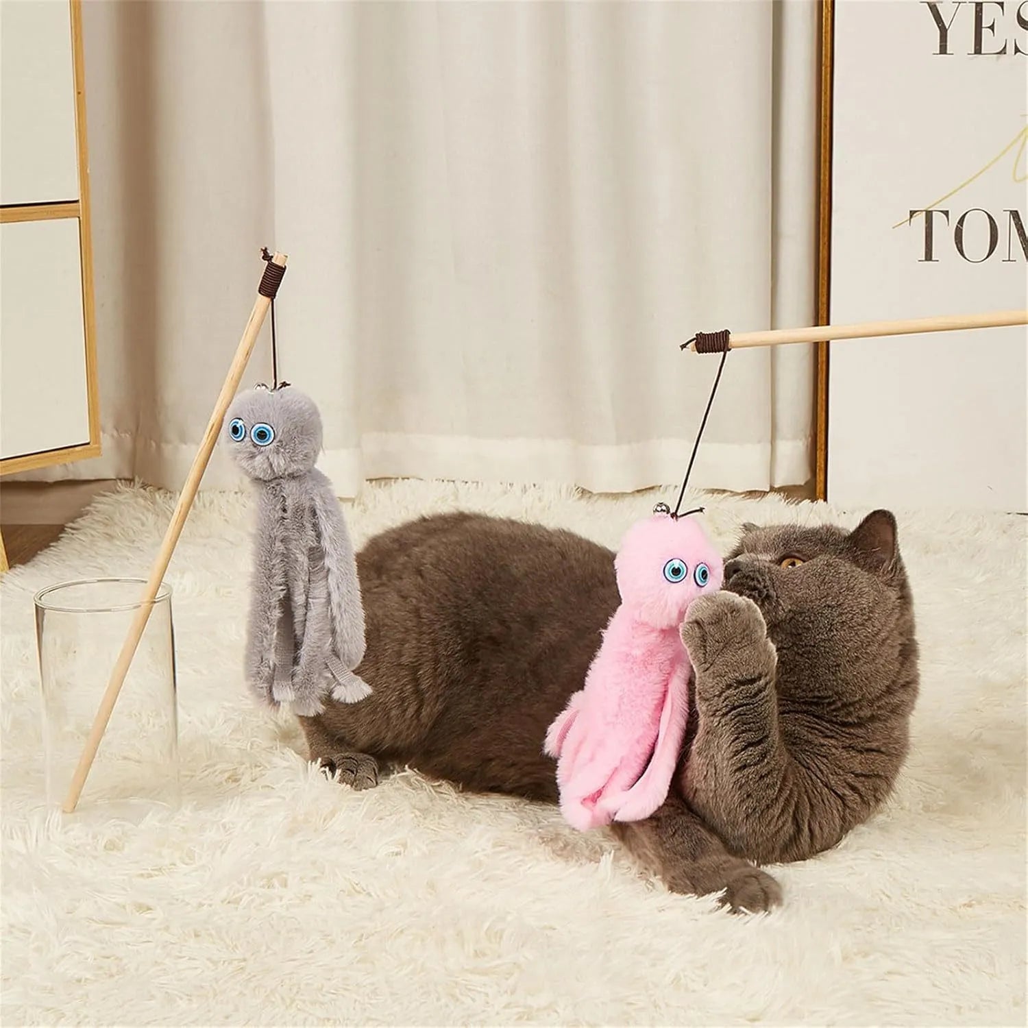 Brightly coloured furry octopus cat toy attached to a long stick for interactive indoor play