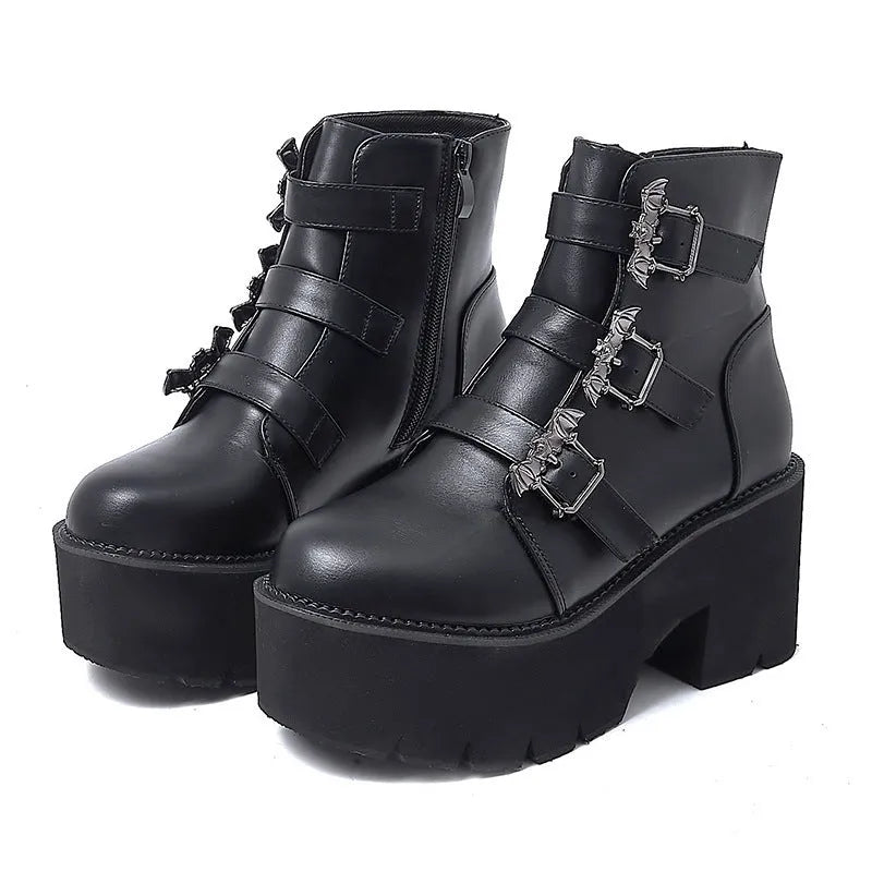 Black women's Harajuku punk gothic short boots with bat buckle and side zip.