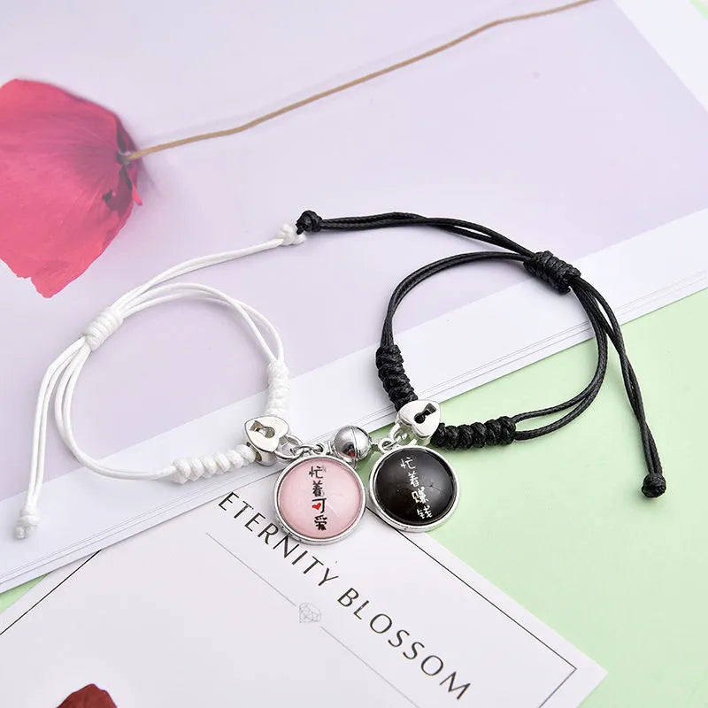 Magnetic couple bracelet pair with alloy electroplating in various designs including clover and crown patterns