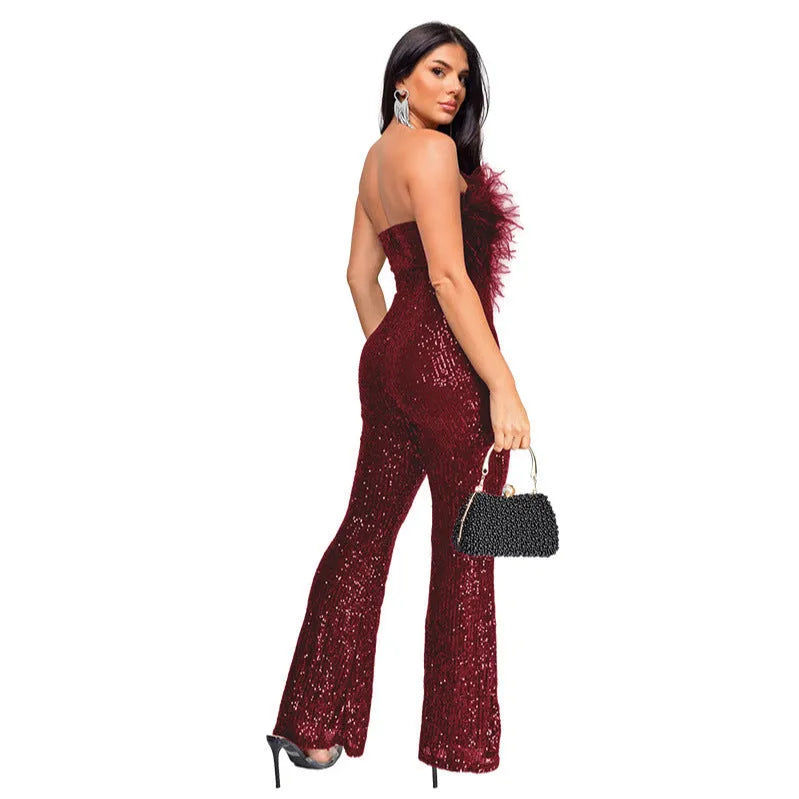 Women's sleeveless backless jumpsuit with flared legs in a champagne colour.