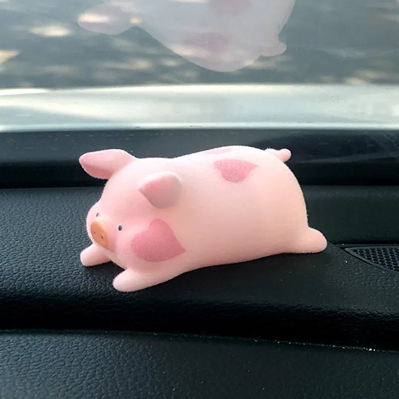 Cute resin cartoon pig car decoration accessory for dashboard.