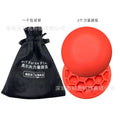 Orange golf strength training mat with centre of gravity pad for swing practice
