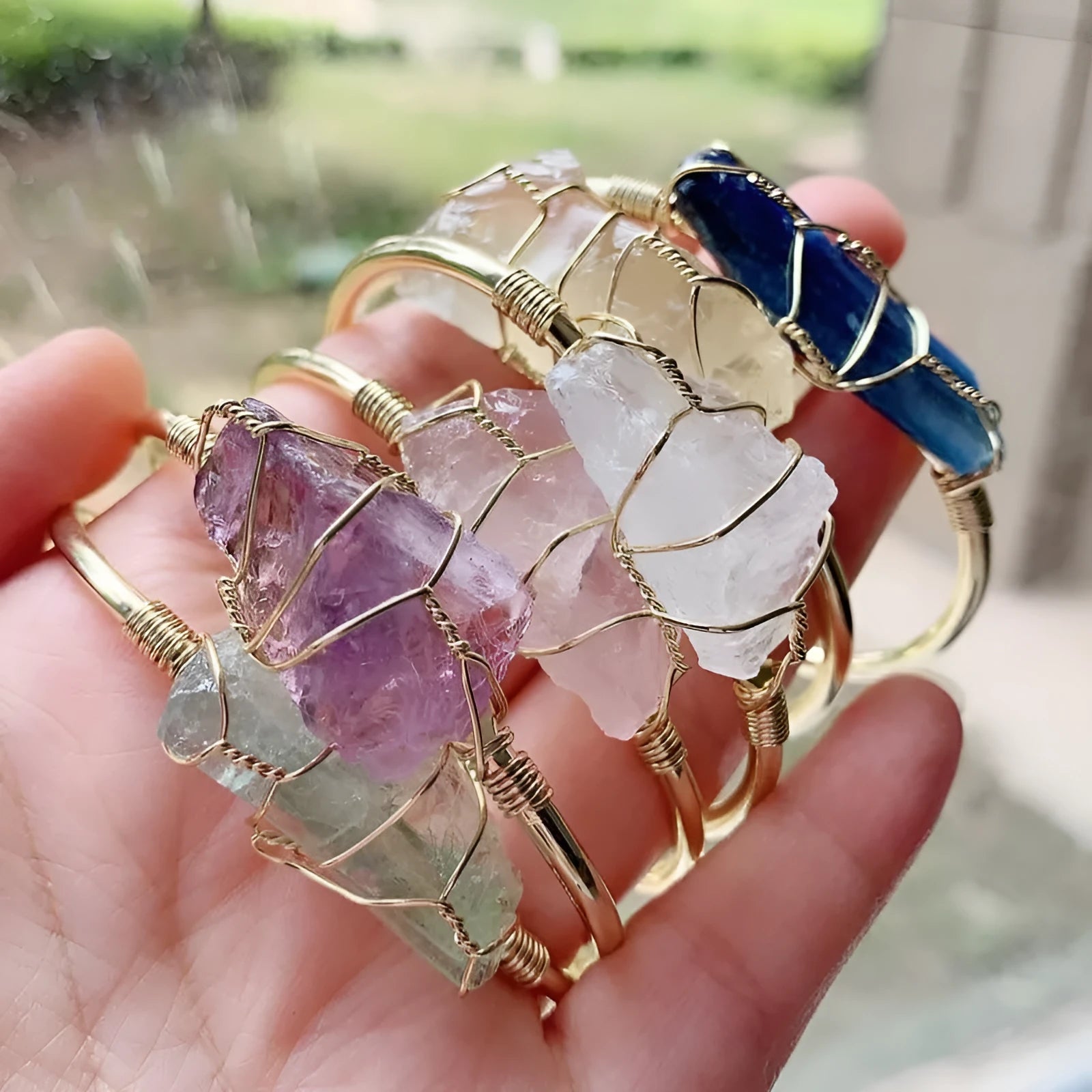 Unshaped natural crystal bracelet with gold winding wire geometric design