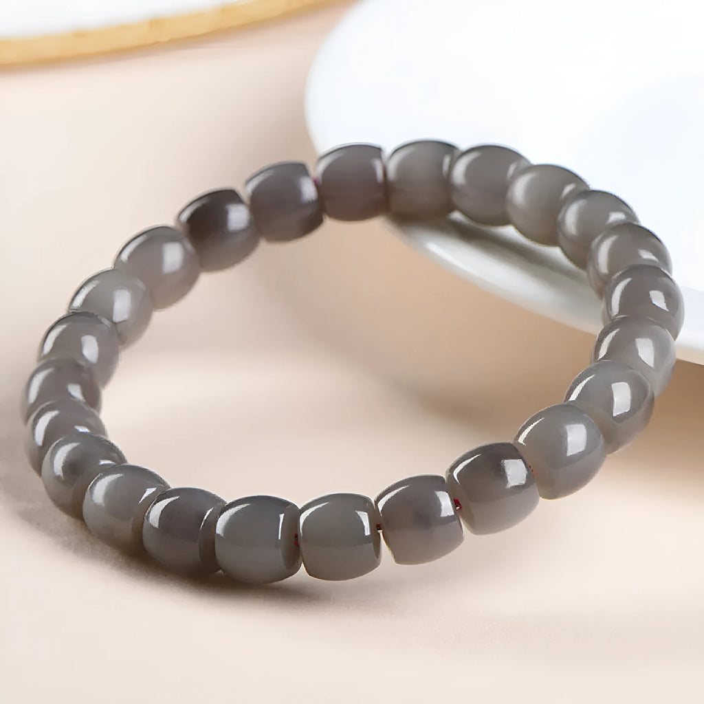 Natural smokey violet Hetian jade straight cut bracelet with approximately 8x9mm beads.