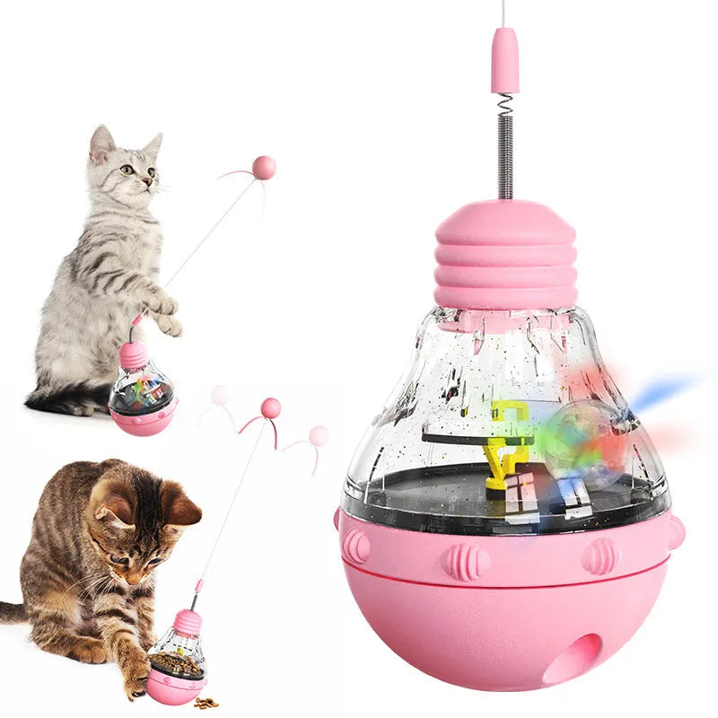 Electric yellow cat wand toy with teaser stick, plastic ball and slow feed dispenser on rocking base