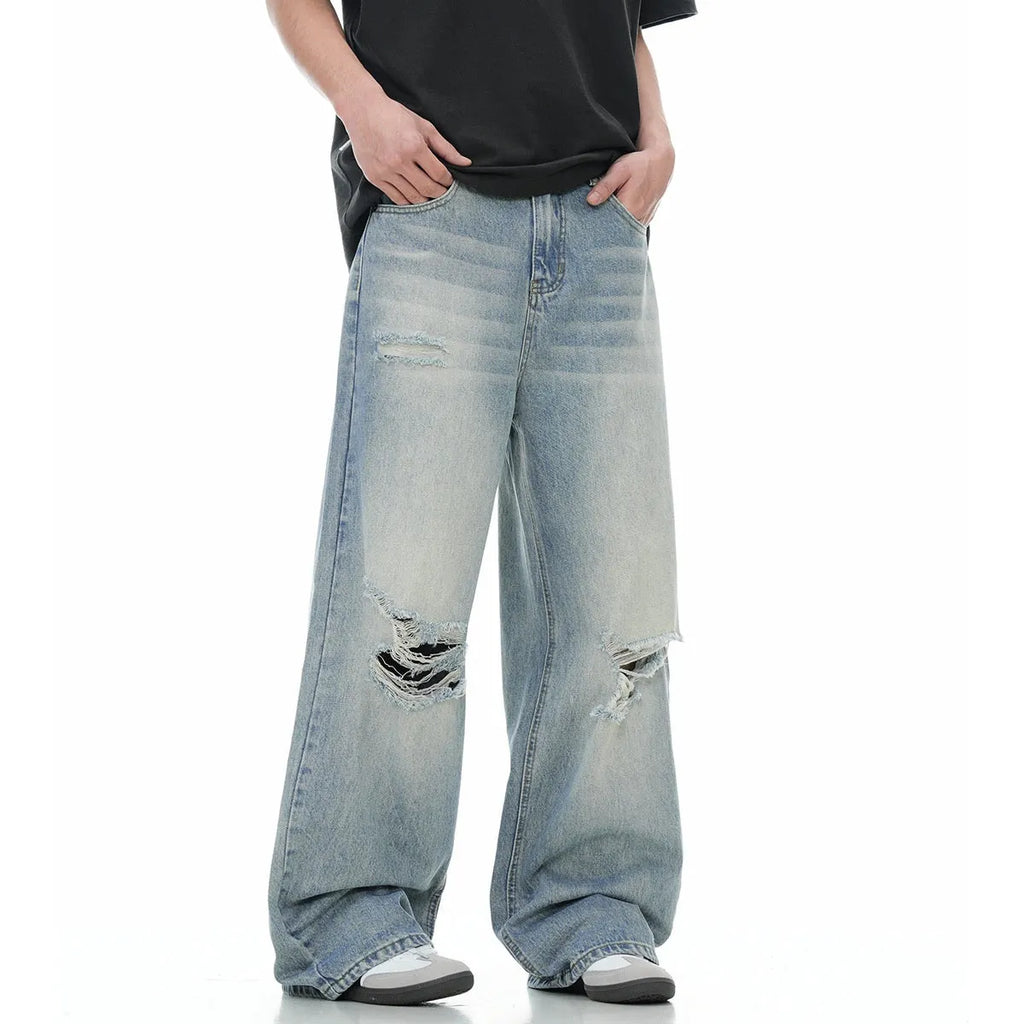Blue men's ripped jeans with straight-leg cut and zipper fly