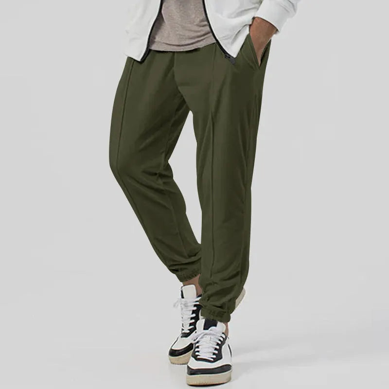 Men's gray elastic track sweatpants with straight-leg tapered design and mid waist