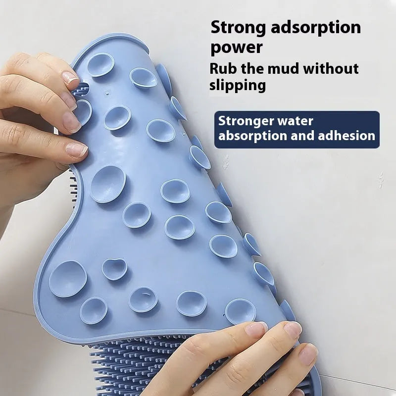 Blue silicone bath massage cushion with textured surface measuring 31cm by 32cm for bathing and relaxation