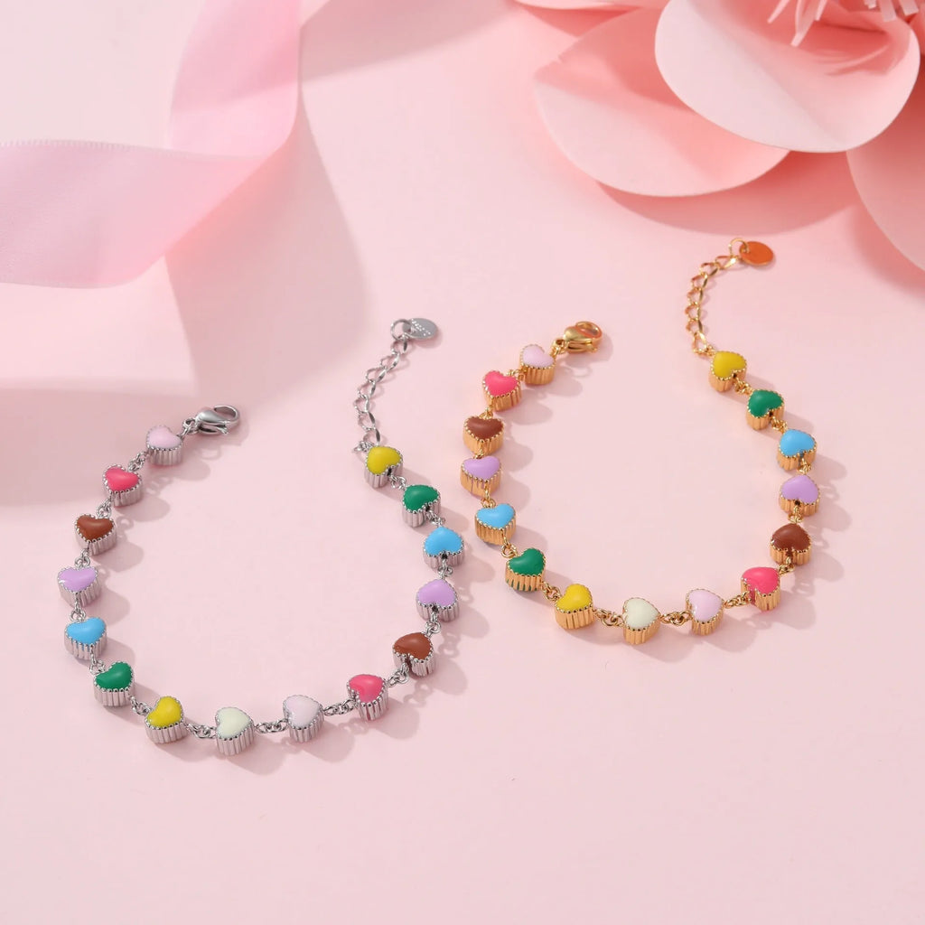 Women's heart-shaped titanium steel bracelet with 18K gold electroplating in gold or steel colour options