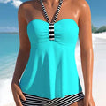 Women's solid colour striped off-shoulder one-piece swimsuit on a mannequin, showing the briefs style and removable lining.
