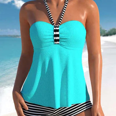 Women's solid colour striped off-shoulder one-piece swimsuit on a mannequin, showing the briefs style and removable lining.