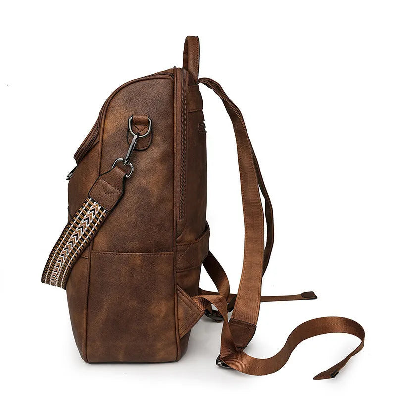 Retro college backpack in black with curved shoulder straps and stitching details