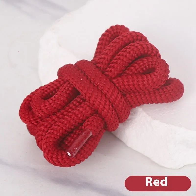 Oval elastic shoelace adapter ropes in various colours on a white background.