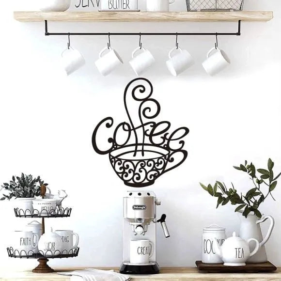 Black wrought iron wall decoration with an English alphabet silhouette design.