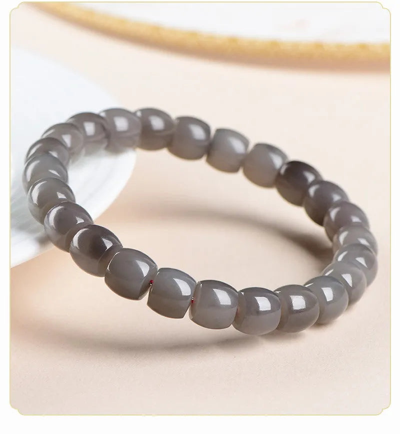 Natural smokey violet Hetian jade straight cut bracelet with approximately 8x9mm beads.