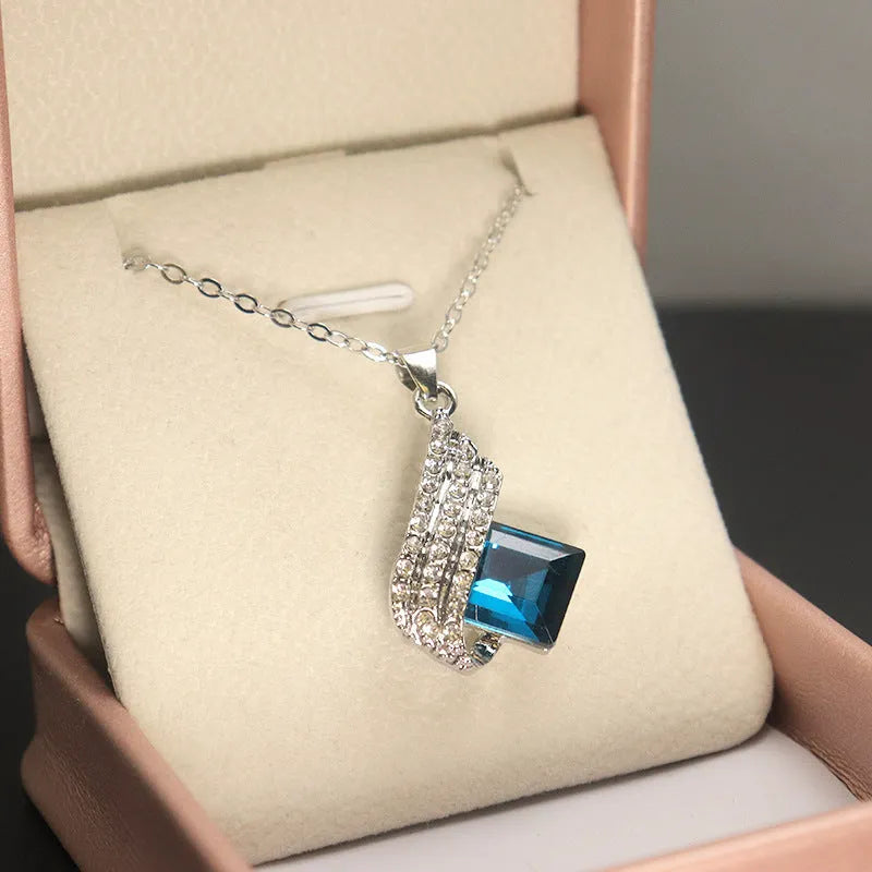 Women's necklace and earring set with cross chain design and glass pendant in alloy with electroplated finish