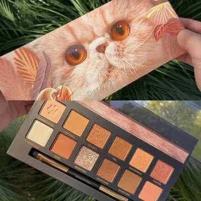 Explorer twelve-colour animal eye shadow palette showing golden tiger, red fox, and spotted tiger designs