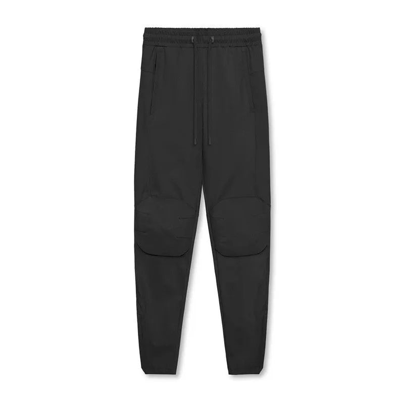 Men's grey ankle-tied fitness trousers with loose casual cut for exercise