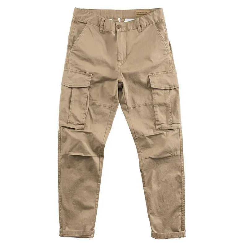Men's solid colour cotton labour protection trousers with multiple pockets, shown in khaki.