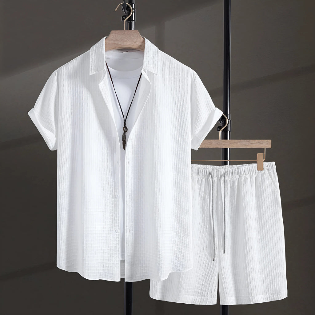 Men's black cotton blend short sleeve shirt and matching shorts set displayed together