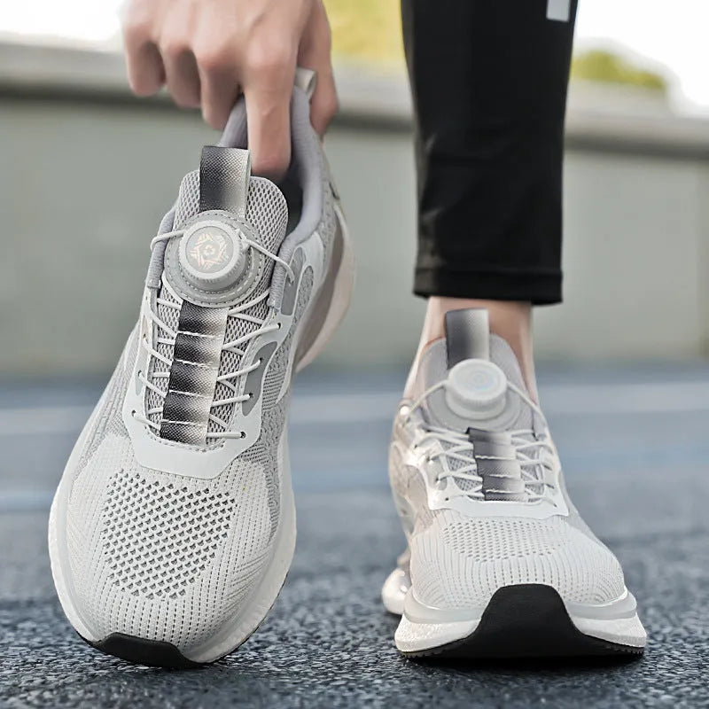 Low-top running shoes with rotating buckle closure in fly-knit mesh construction