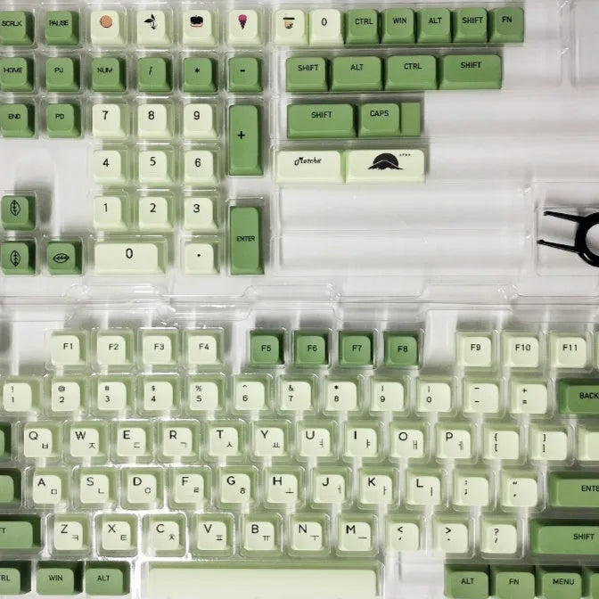 124 Key Matcha green and beige PBT keycap set for mechanical keyboards, showing multiple language layout options.