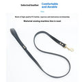 Black and maroon PU leather dog traction belt with metal clip.