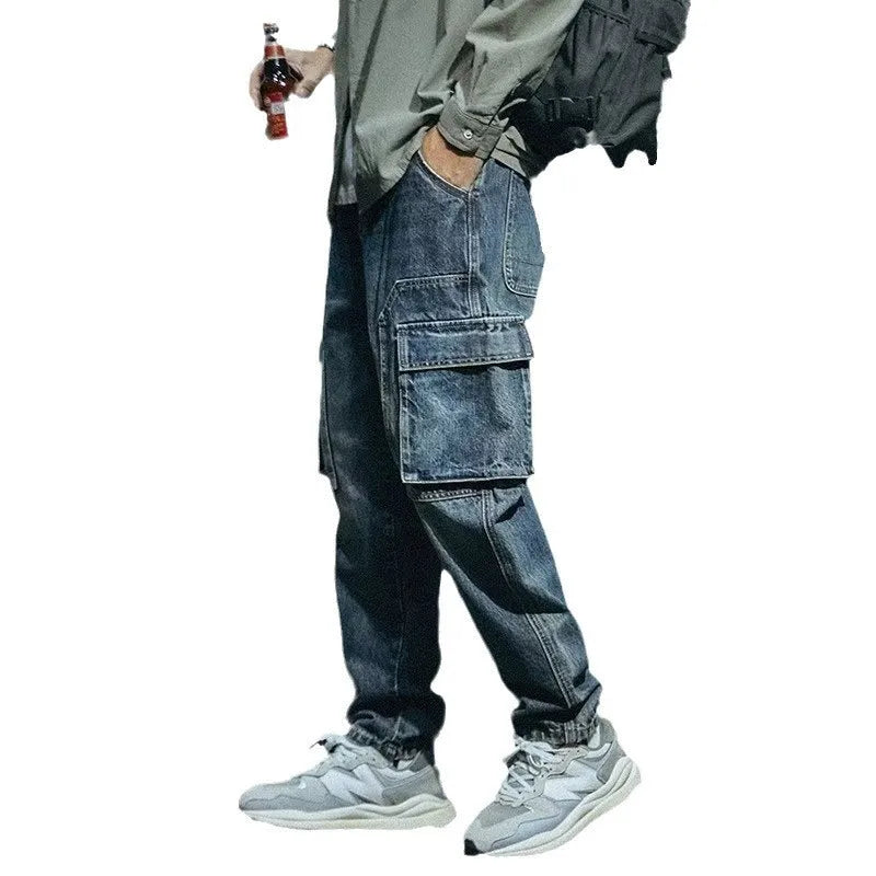 Men's blue loose straight-leg retro trousers with zip fly on size chart background