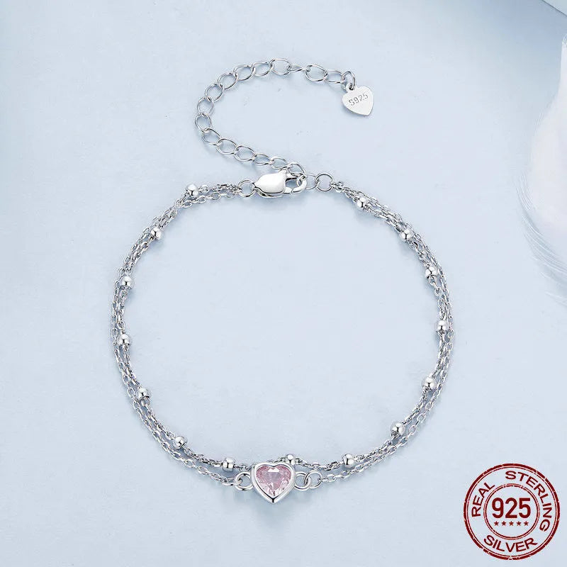 Women's sweet style 925 sterling silver bracelet with a small heart pendant on an adjustable chain.