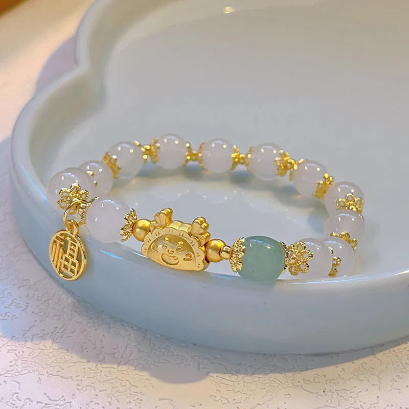 Women's floral glazed glass bracelet with electroplated zodiac charm and coloured beads