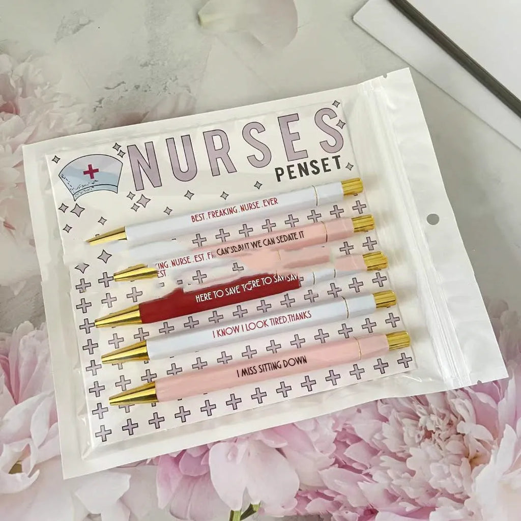 Set of five nurse-themed ballpoint pens with humorous nursing copywriting printed on plastic barrels