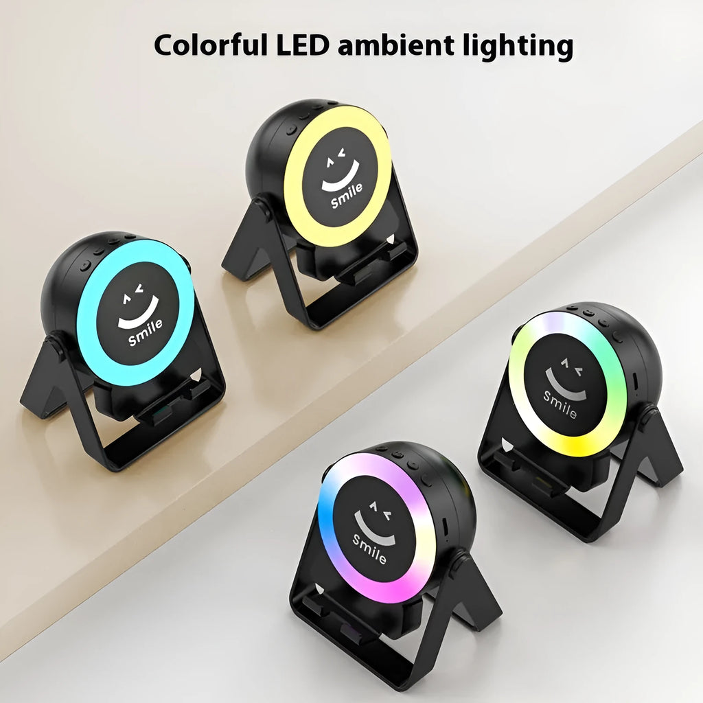 Black induction bracket Bluetooth speaker with colourful LED lights illuminated, showing its compact design.