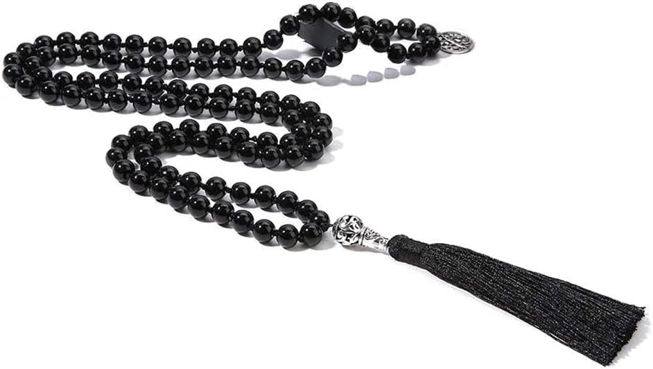 Handmade knotted beaded necklace with stone pendant showing 108 beads and geometric design