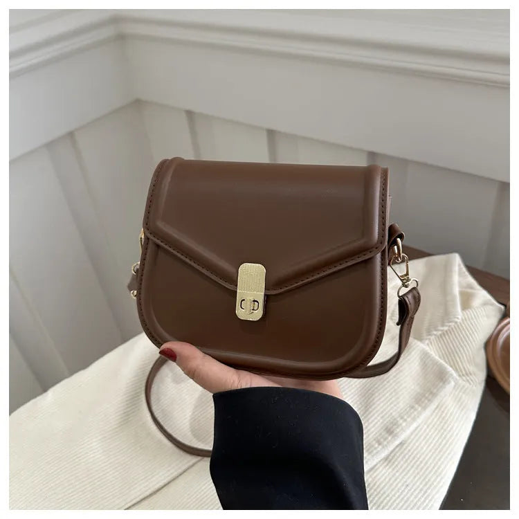 Soft PU leather clamshell messenger bag in horizontal square shape showing four colour options