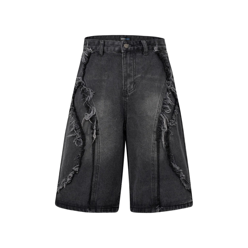Distressed denim shorts with raw edge hem in light blue, shown in a straight-leg cropped fit.